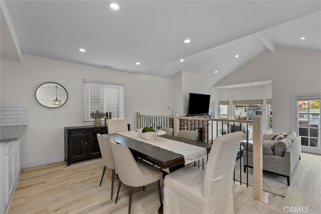 1727 Spreckels Lane Redondo Beach, CA 90278 - Photo 6 of 35 a view of a dining room with furniture a rug and wooden floor