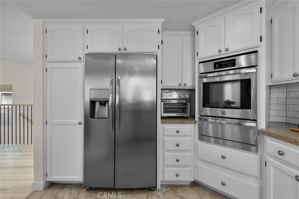 1727 Spreckels Lane Redondo Beach, CA 90278 - Photo 9 of 35 a kitchen with appliances and cabinets