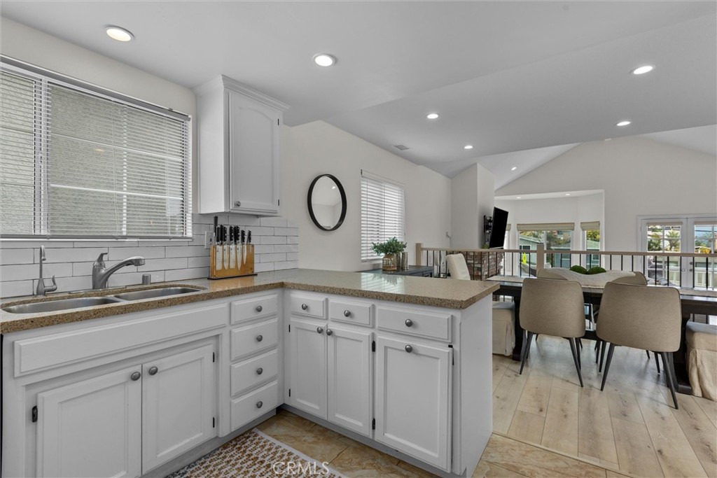 1727 Spreckels Lane Redondo Beach, CA 90278 - Photo 10 of 35 a kitchen with a sink cabinets and window
