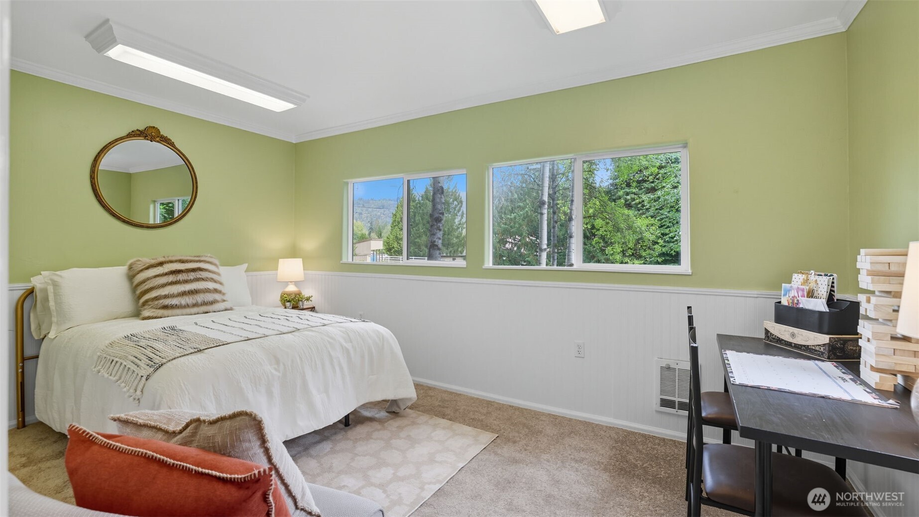 12450 186th Place Southeast Renton, WA 98059 - Photo 13 of 22 a bedroom with a bed and a window