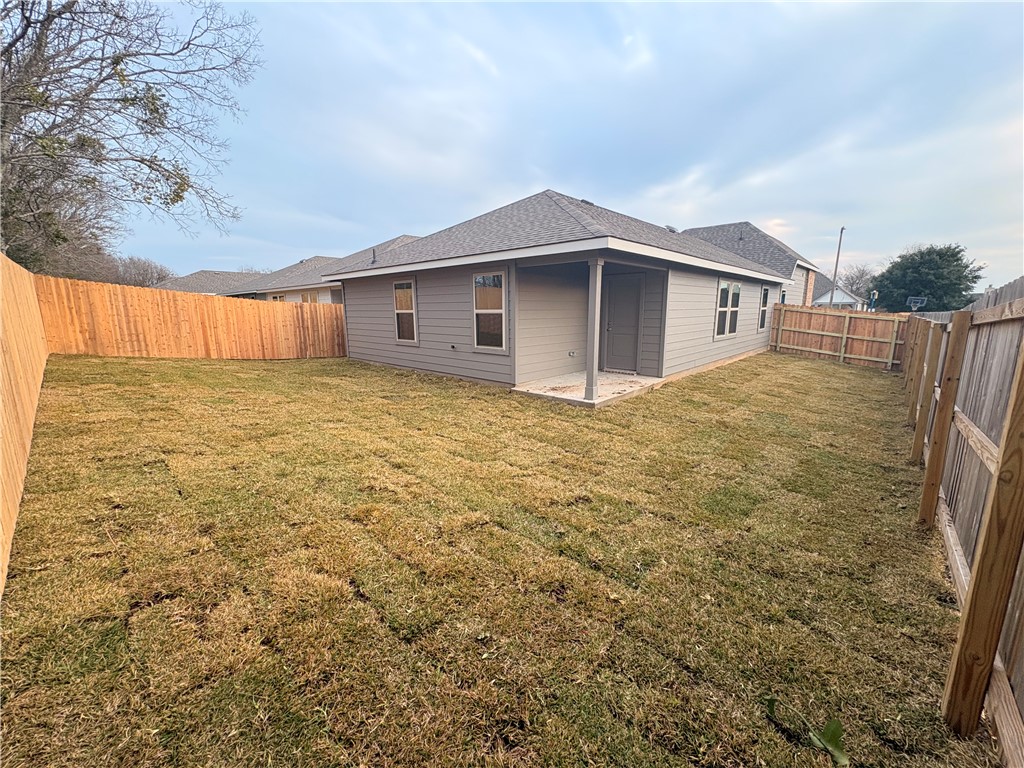 2305 White Wing Navasota, TX 77868 - Photo 7 of 7 a house with a outdoor space