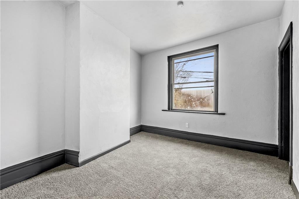 1306 Complete Street Pittsburgh, PA 15212 - Photo 11 of 24 a view of an empty room with window