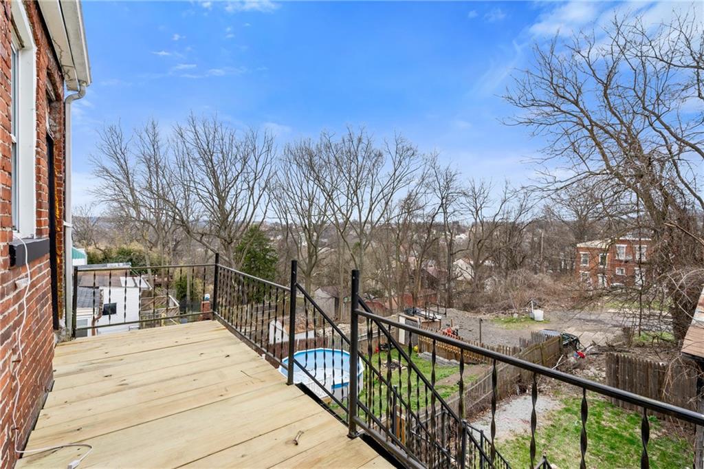 1306 Complete Street Pittsburgh, PA 15212 - Photo 23 of 24 a view of a balcony with trees