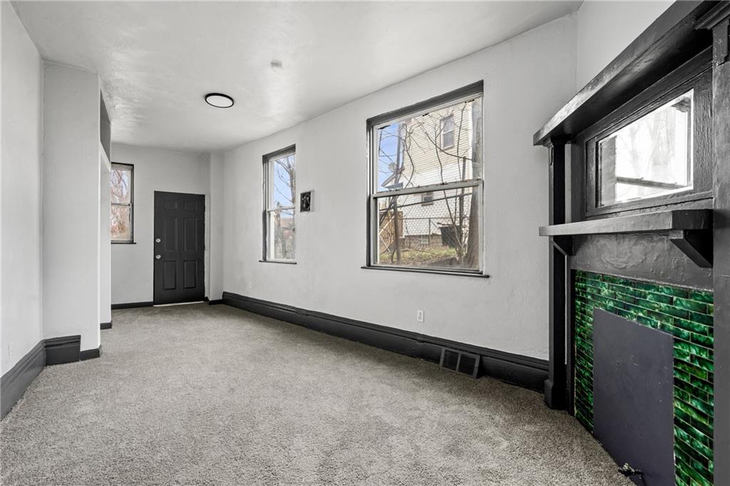 1306 Complete Street Pittsburgh, PA 15212 - Photo 3 of 24 an empty room with windows