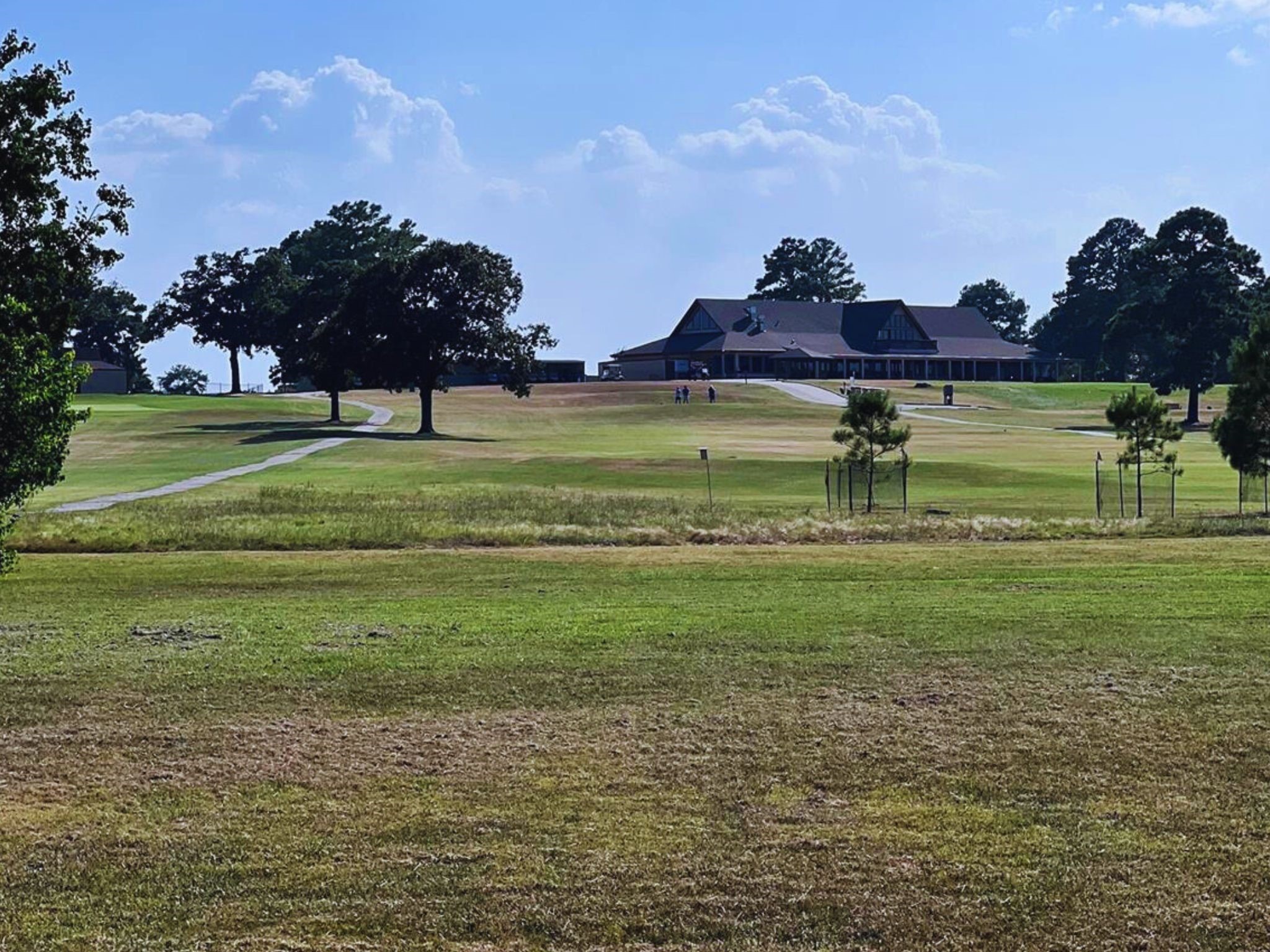 56-58 Cherry Hills Trinity, TX 75862 - Photo 9 of 10 a view of a golf course with a lake