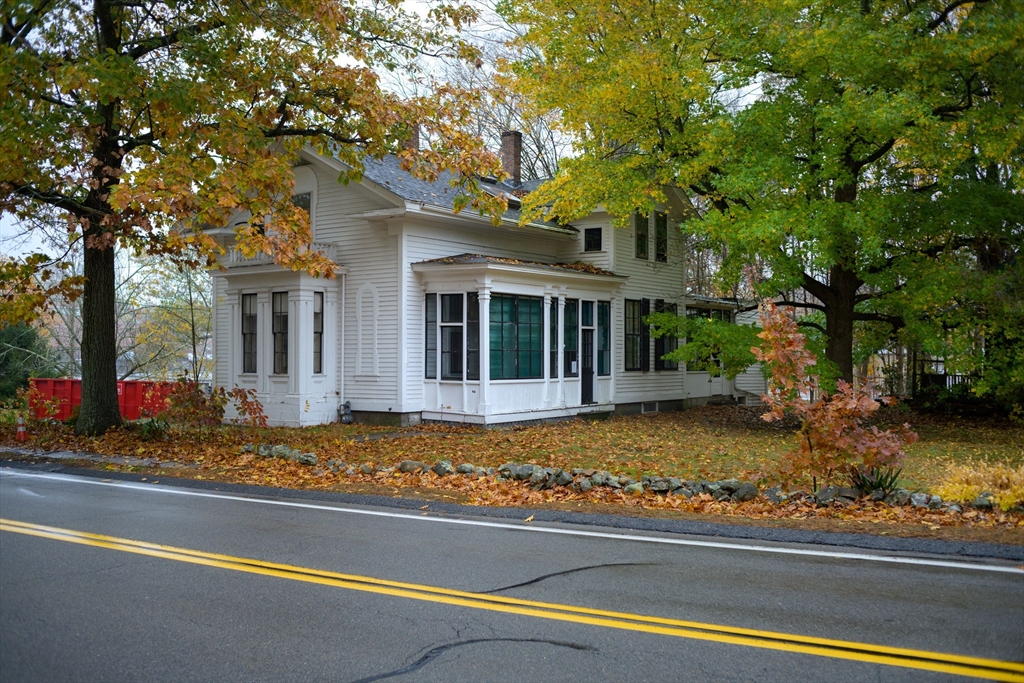84 South Street Foxboro, MA 02035 - Photo 2 of 2 a front view of a house with garden