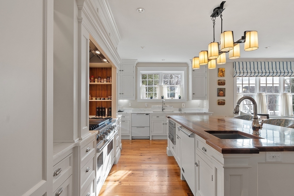 315 Musketaquid Road Concord, MA 01742 - Photo 11 of 41 a kitchen with counter top space and sink