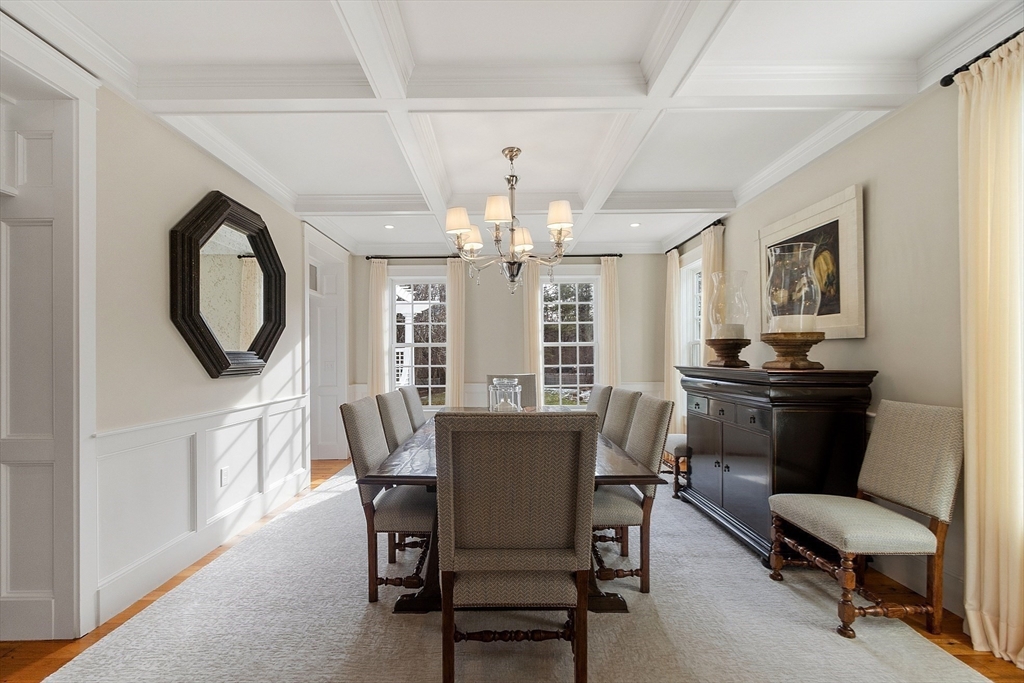 315 Musketaquid Road Concord, MA 01742 - Photo 19 of 41 a view of a dining room with furniture and chandelier