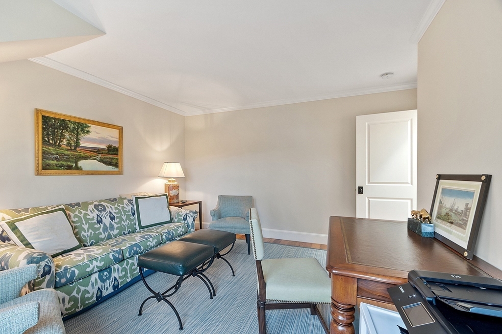 315 Musketaquid Road Concord, MA 01742 - Photo 26 of 41 a living room with furniture and a desk