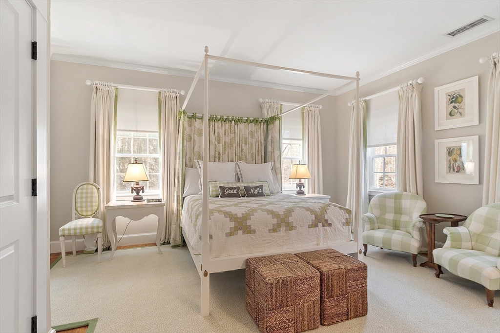 315 Musketaquid Road Concord, MA 01742 - Photo 29 of 41 a spacious bedroom with furniture and a large window
