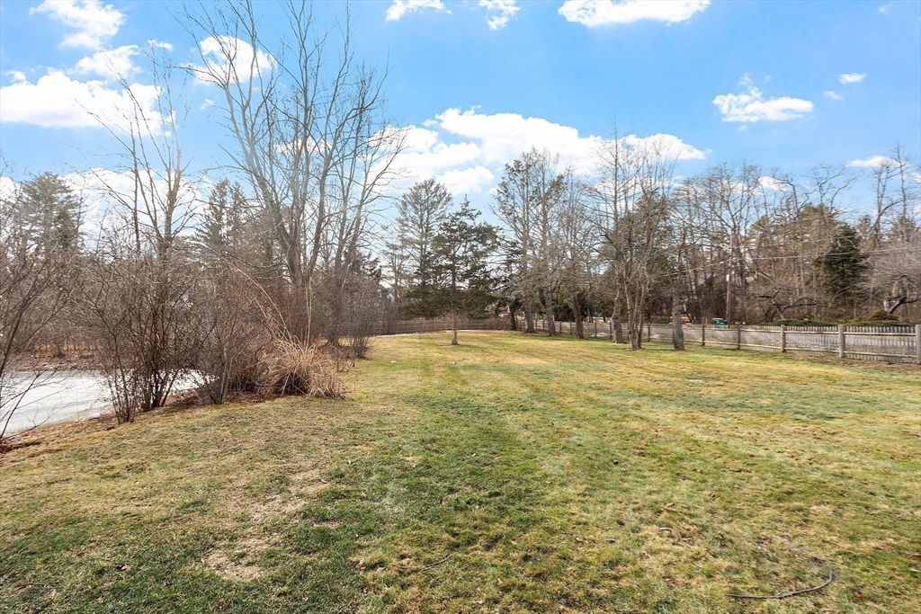 315 Musketaquid Road Concord, MA 01742 - Photo 38 of 41 a view of outdoor space with trees