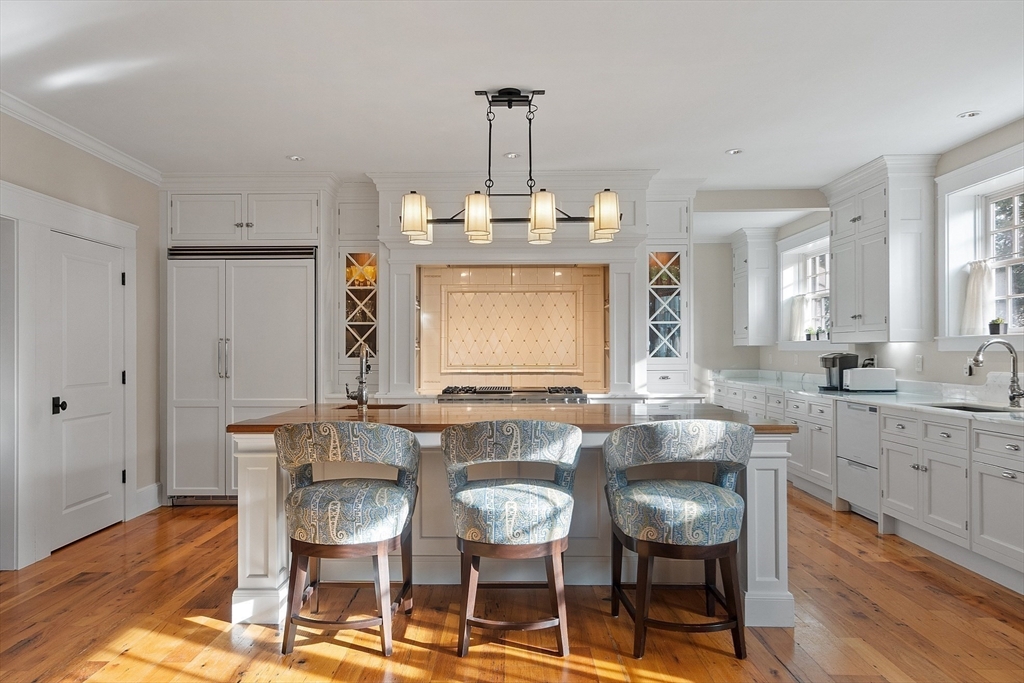 315 Musketaquid Road Concord, MA 01742 - Photo 10 of 41 a view of a a dining room with furniture window and wooden floor
