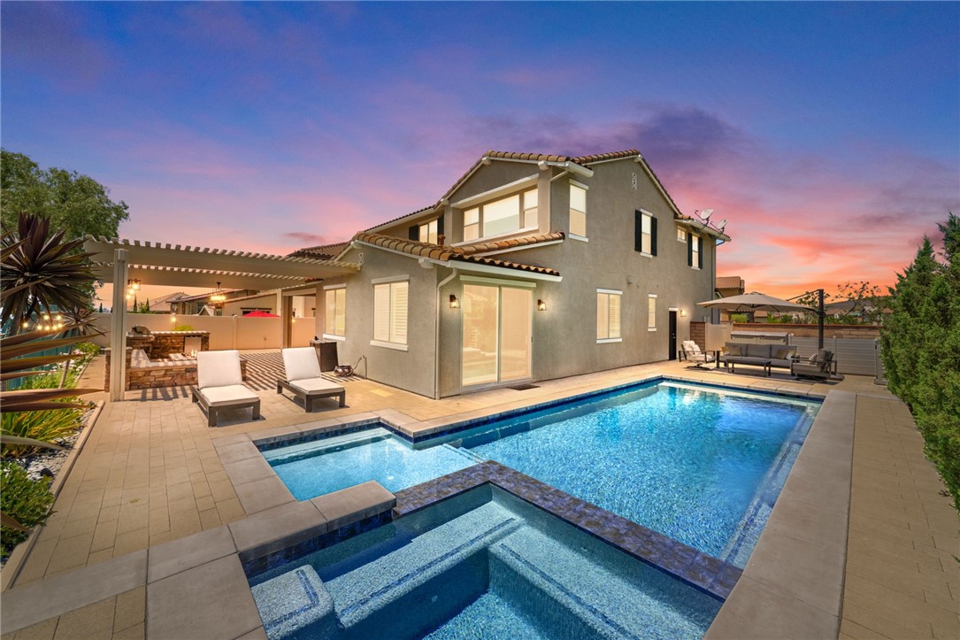 39148 Steeplechase Lane Temecula, CA 92591 - Photo 3 of 65 a view of a house with pool and chairs