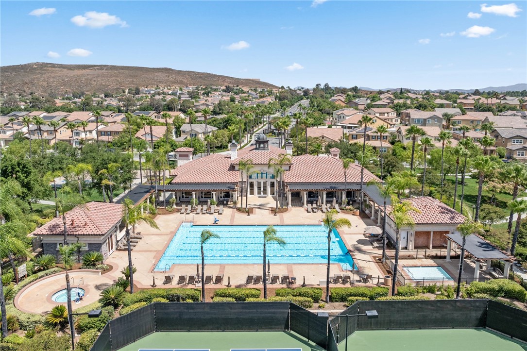39148 Steeplechase Lane Temecula, CA 92591 - Photo 52 of 65 an aerial view of a house with a garden and lake view