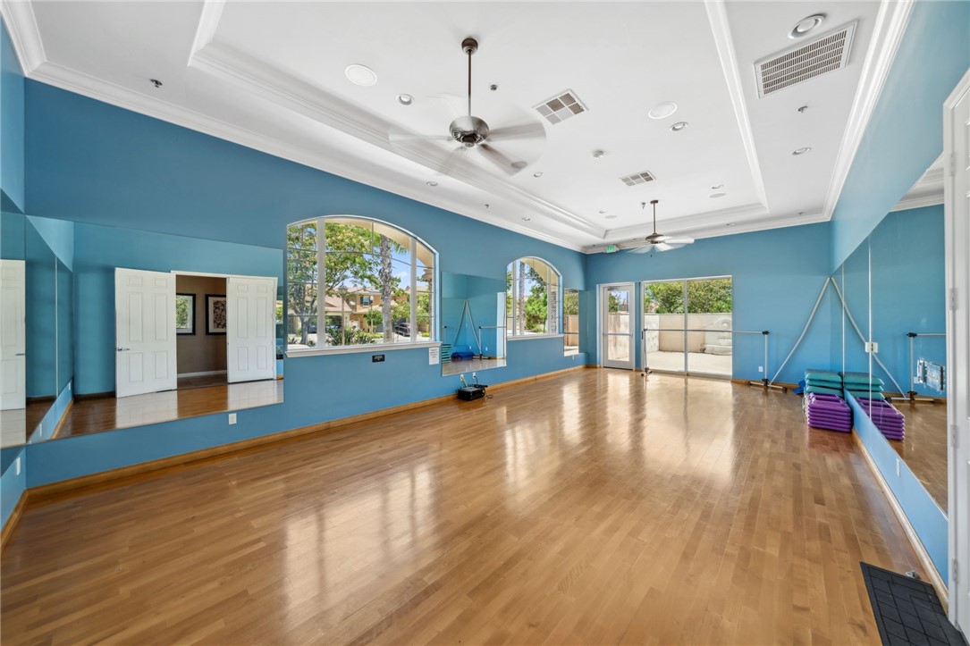 39148 Steeplechase Lane Temecula, CA 92591 - Photo 57 of 65 a view of an empty room with window and wooden floor