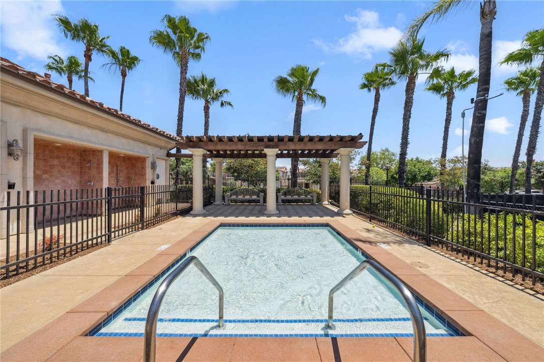 39148 Steeplechase Lane Temecula, CA 92591 - Photo 61 of 65 a view of swimming pool with a patio and a garden