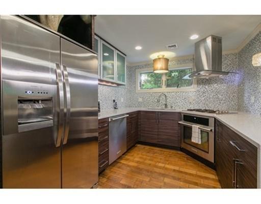 26 Tyler Road Lexington, MA 02420 - Photo 22 of 29 a kitchen with granite countertop stainless steel appliances and counter space