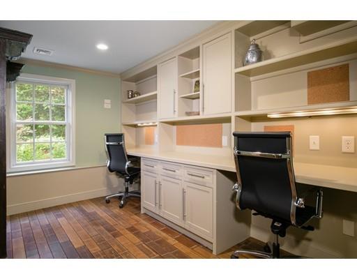 26 Tyler Road Lexington, MA 02420 - Photo 26 of 29 a kitchen with a sink cabinets and wooden floor