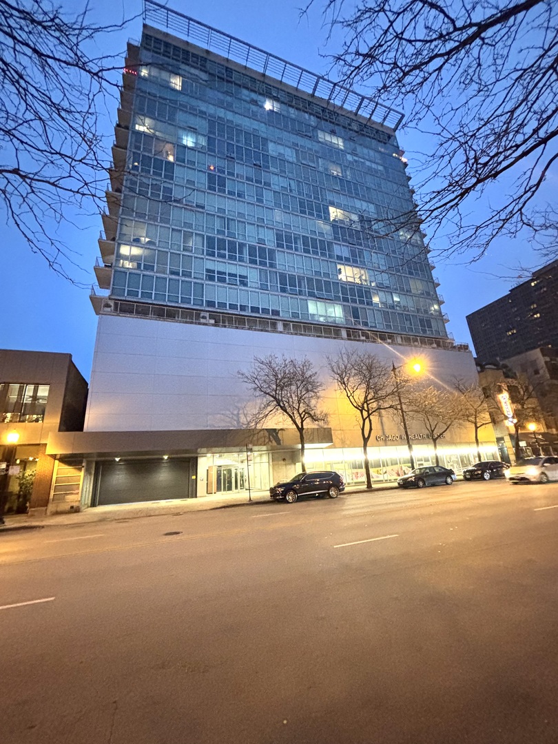 a view of a building with a street