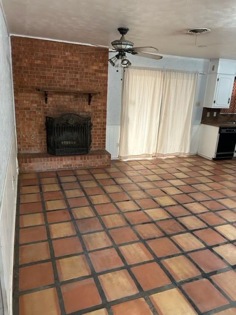 5313 46th Street Lubbock, TX 79414 - Photo 3 of 10 a view of a livingroom with a fireplace and a window
