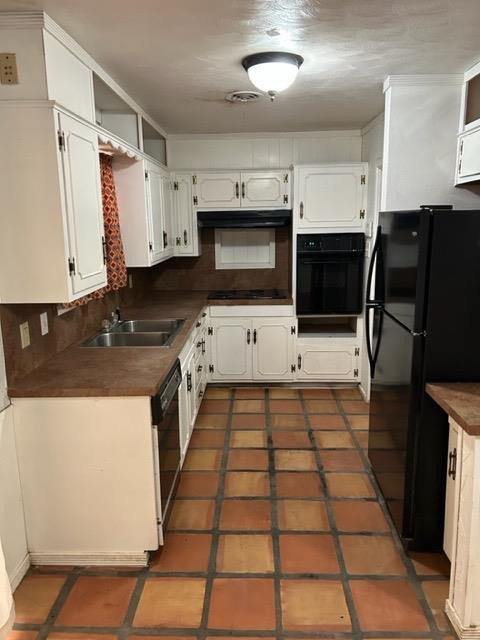 5313 46th Street Lubbock, TX 79414 - Photo 4 of 10 a kitchen with granite countertop a stove a sink and a microwave
