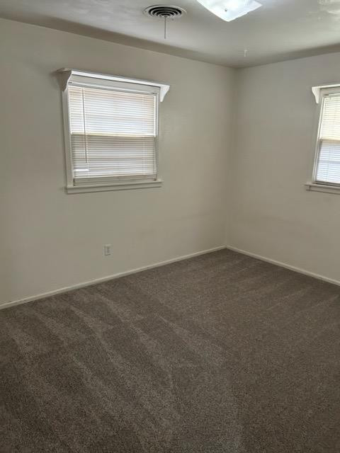 5313 46th Street Lubbock, TX 79414 - Photo 7 of 10 an empty room with a window