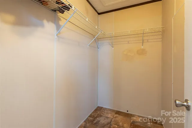 a view of a room with racks on the wall