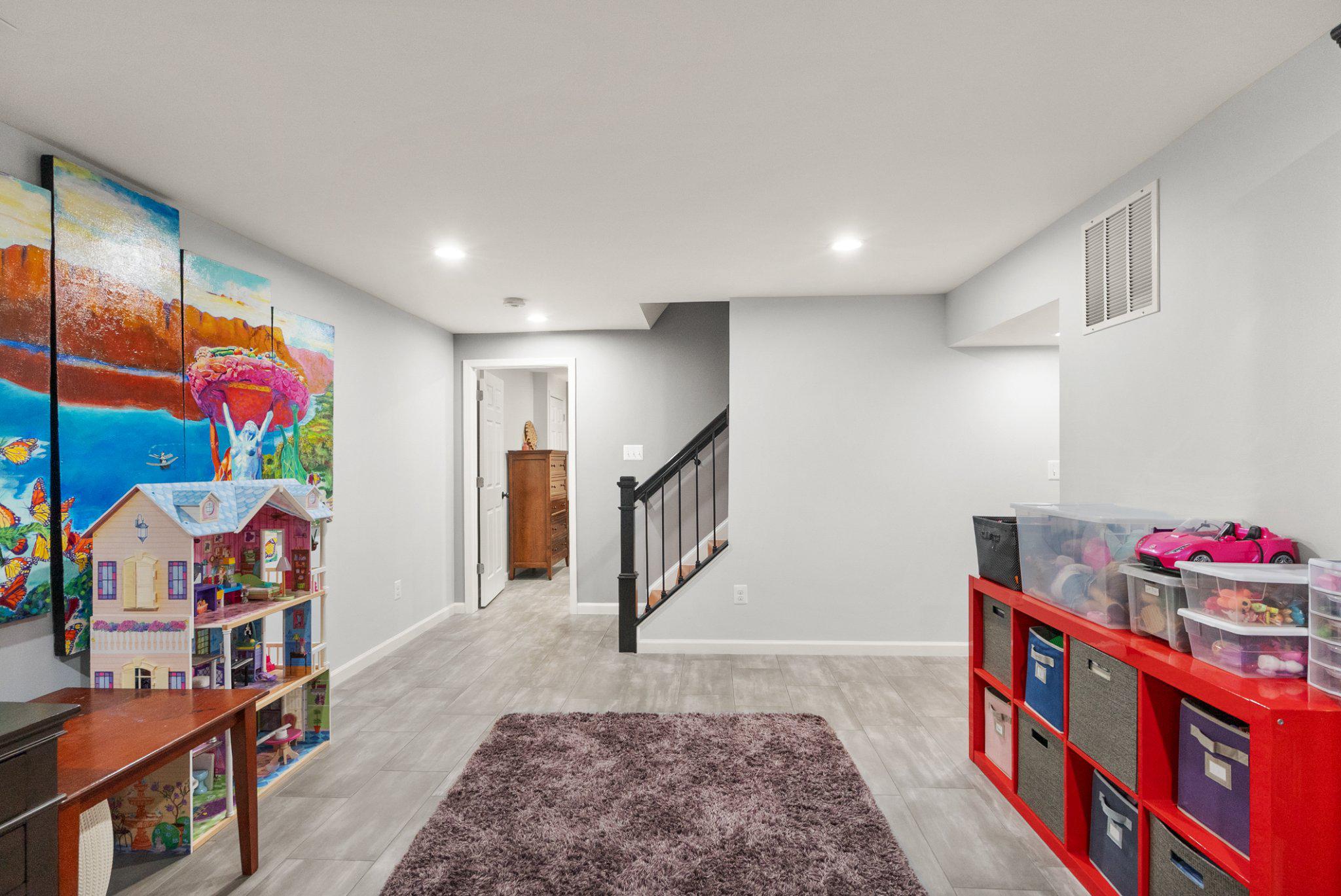 1232 Bishopsgate Way Reston, VA 20194 - Photo 54 of 84 Bright and inviting basement retreat.