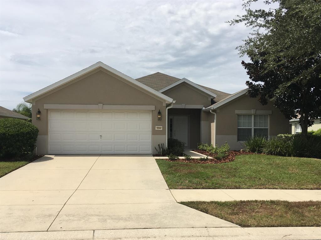 5544 Southwest 44th Road Ocala, FL 34474 - Photo 1 of 1 front view of a house with yard