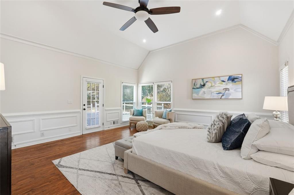 1520 Natchez Way Grayson, GA 30017 - Photo 28 of 63 a bedroom with a bed and wooden floor