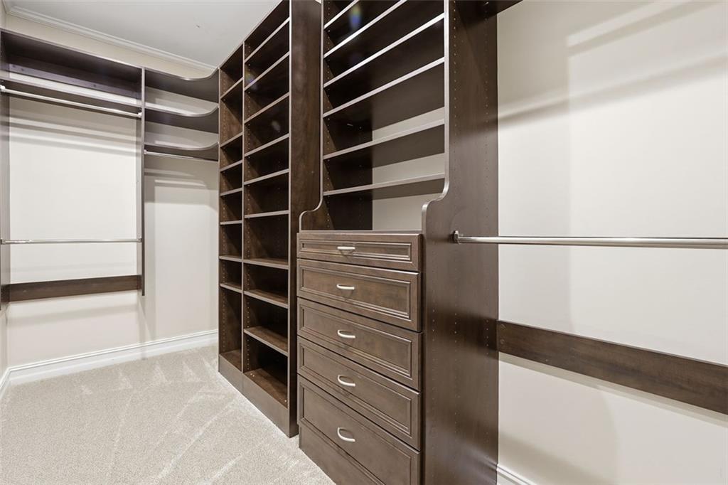 1520 Natchez Way Grayson, GA 30017 - Photo 31 of 63 a view of walk in closet with empty racks