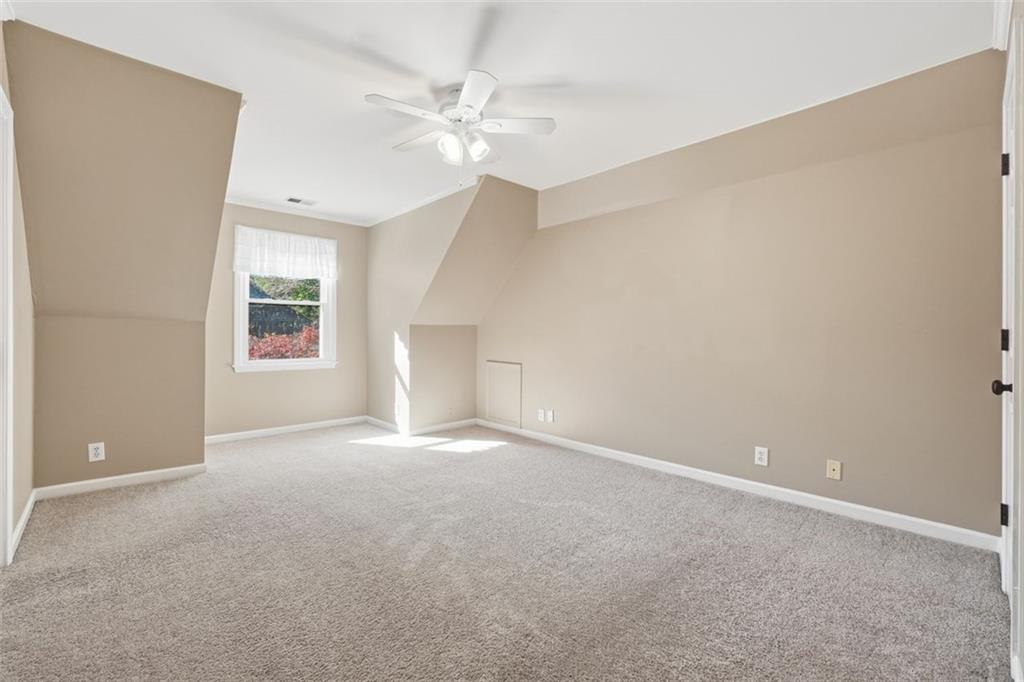 1520 Natchez Way Grayson, GA 30017 - Photo 32 of 63 a view of an empty room with a window