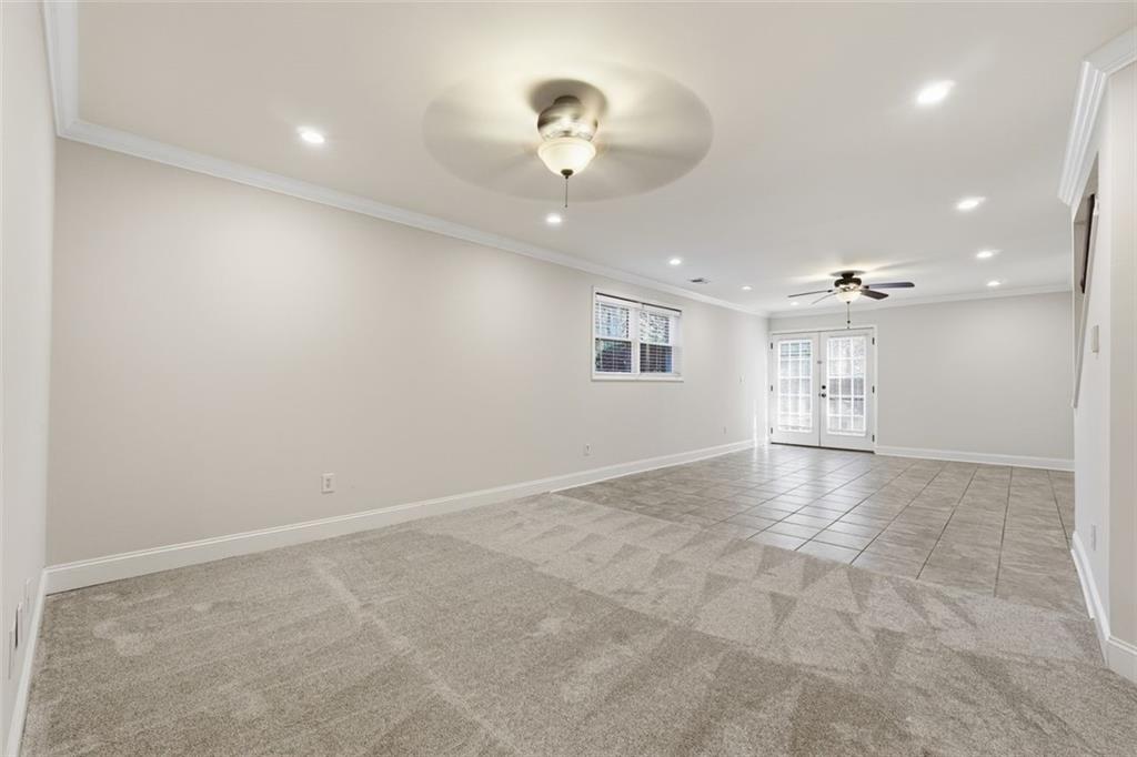 1520 Natchez Way Grayson, GA 30017 - Photo 38 of 63 wooden floor in an empty room with a window