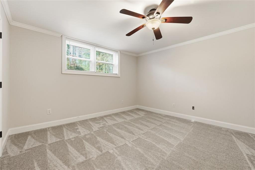 1520 Natchez Way Grayson, GA 30017 - Photo 40 of 63 a view of an empty room with a window