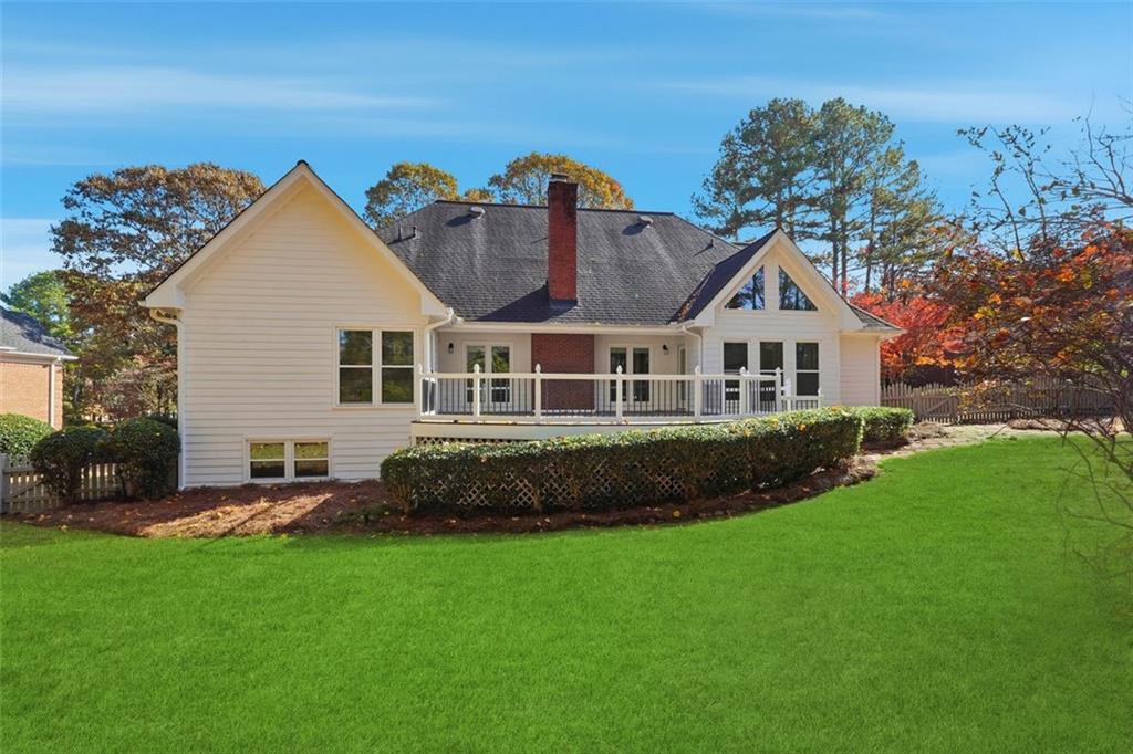 1520 Natchez Way Grayson, GA 30017 - Photo 45 of 63 a front view of a house with a garden