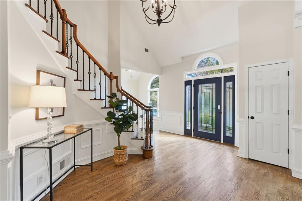 1520 Natchez Way Grayson, GA 30017 - Photo 5 of 63 a view of entryway and hall with wooden floor
