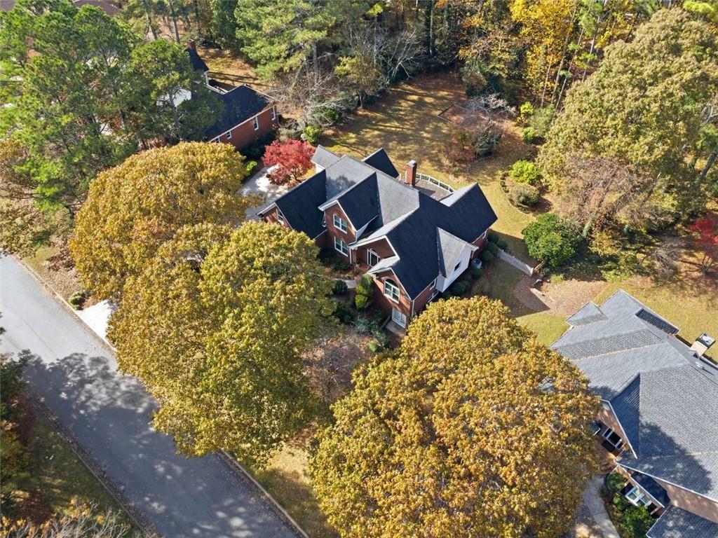 1520 Natchez Way Grayson, GA 30017 - Photo 51 of 63 a aerial view of a house with a yard and garden