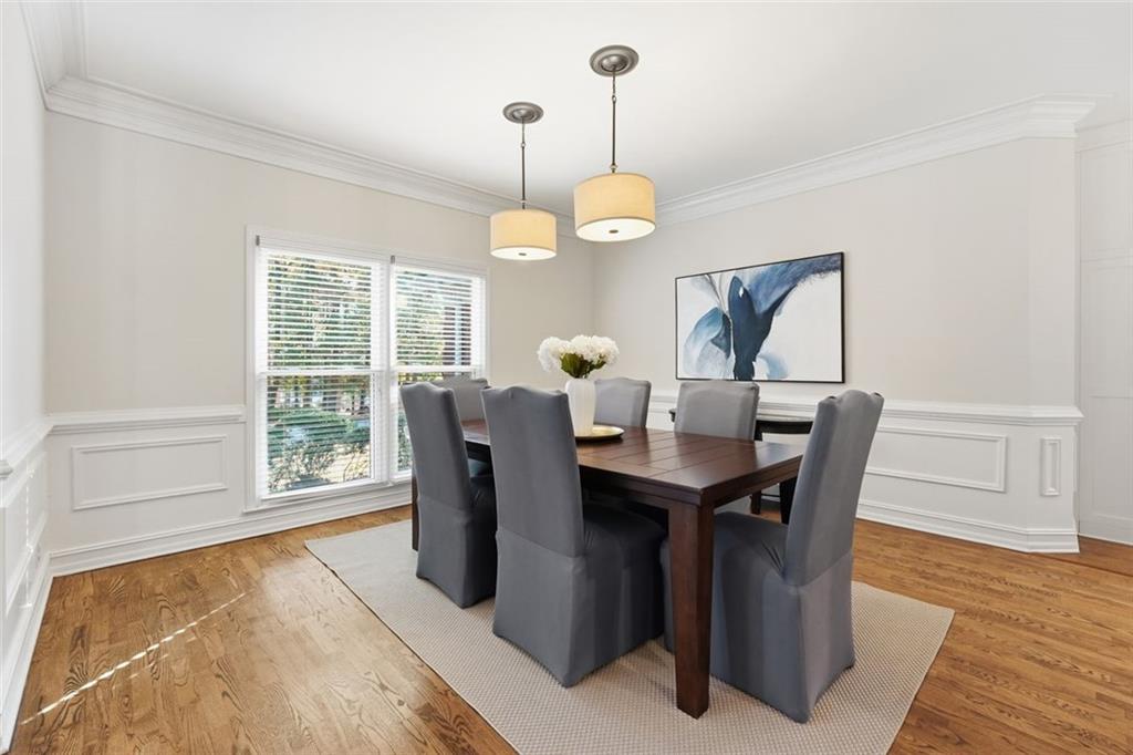 1520 Natchez Way Grayson, GA 30017 - Photo 7 of 63 a view of a dining room with furniture window and wooden floor