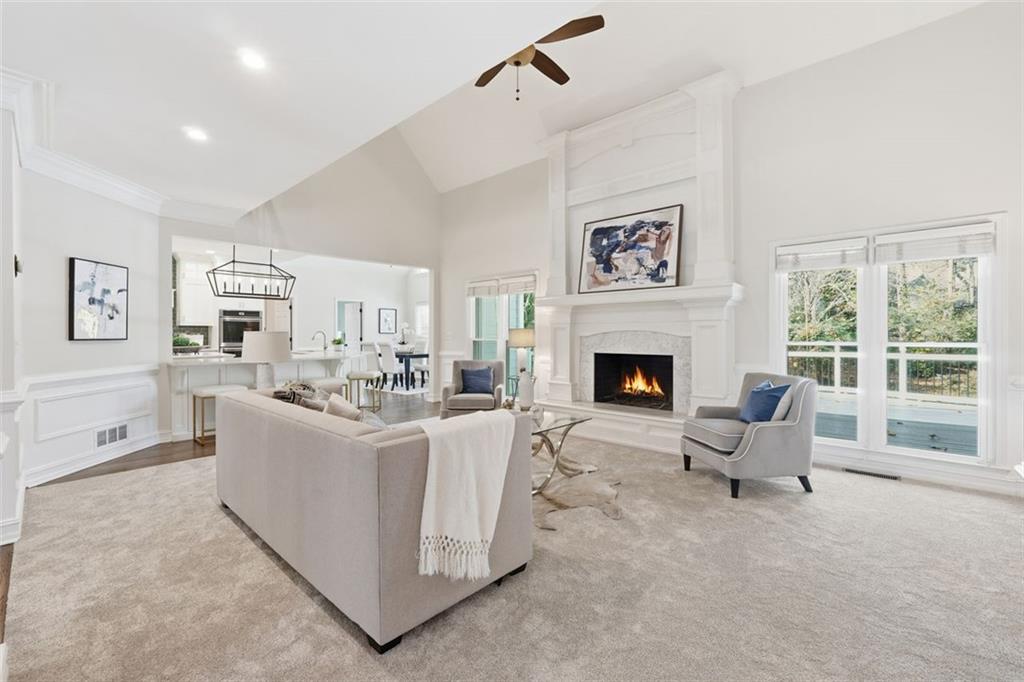 1520 Natchez Way Grayson, GA 30017 - Photo 9 of 63 a living room with furniture and a fireplace