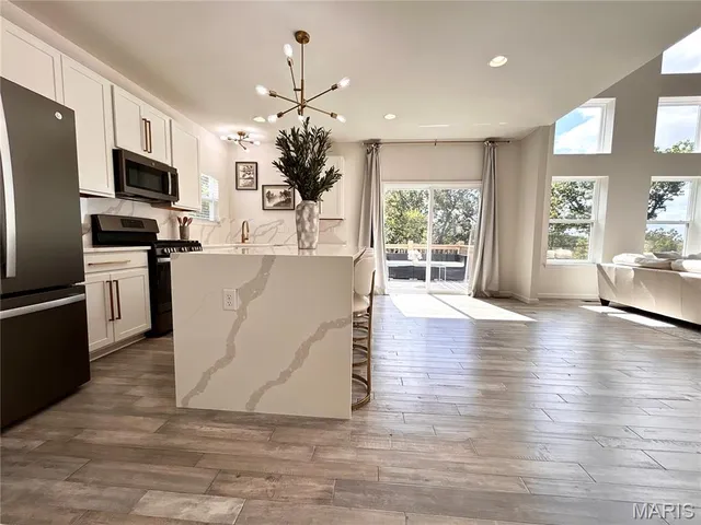 $590,000 | 7474 Shadow Point Drive, St. Louis, MO 63129