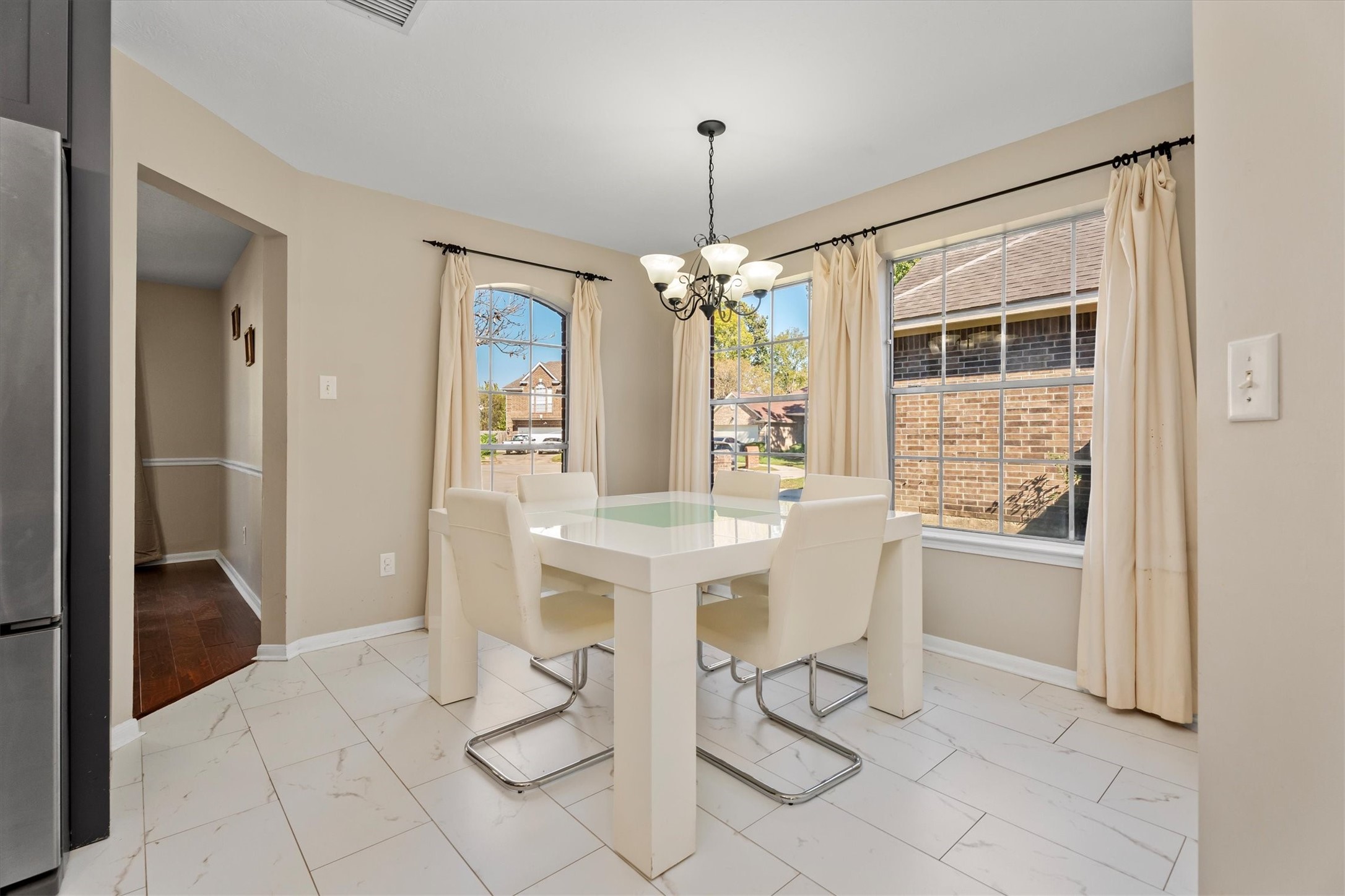 3315 La Seine Lane Spring, TX 77388 - Photo 11 of 30 a dining room with chandelier and window