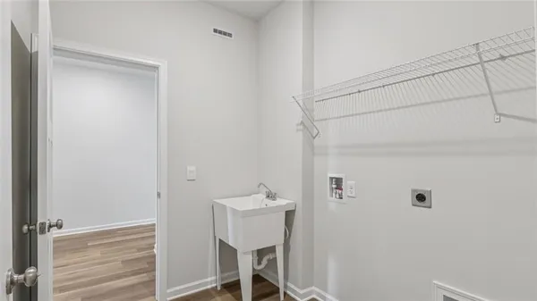 a bathroom with a sink and shower