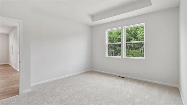 an empty room with windows