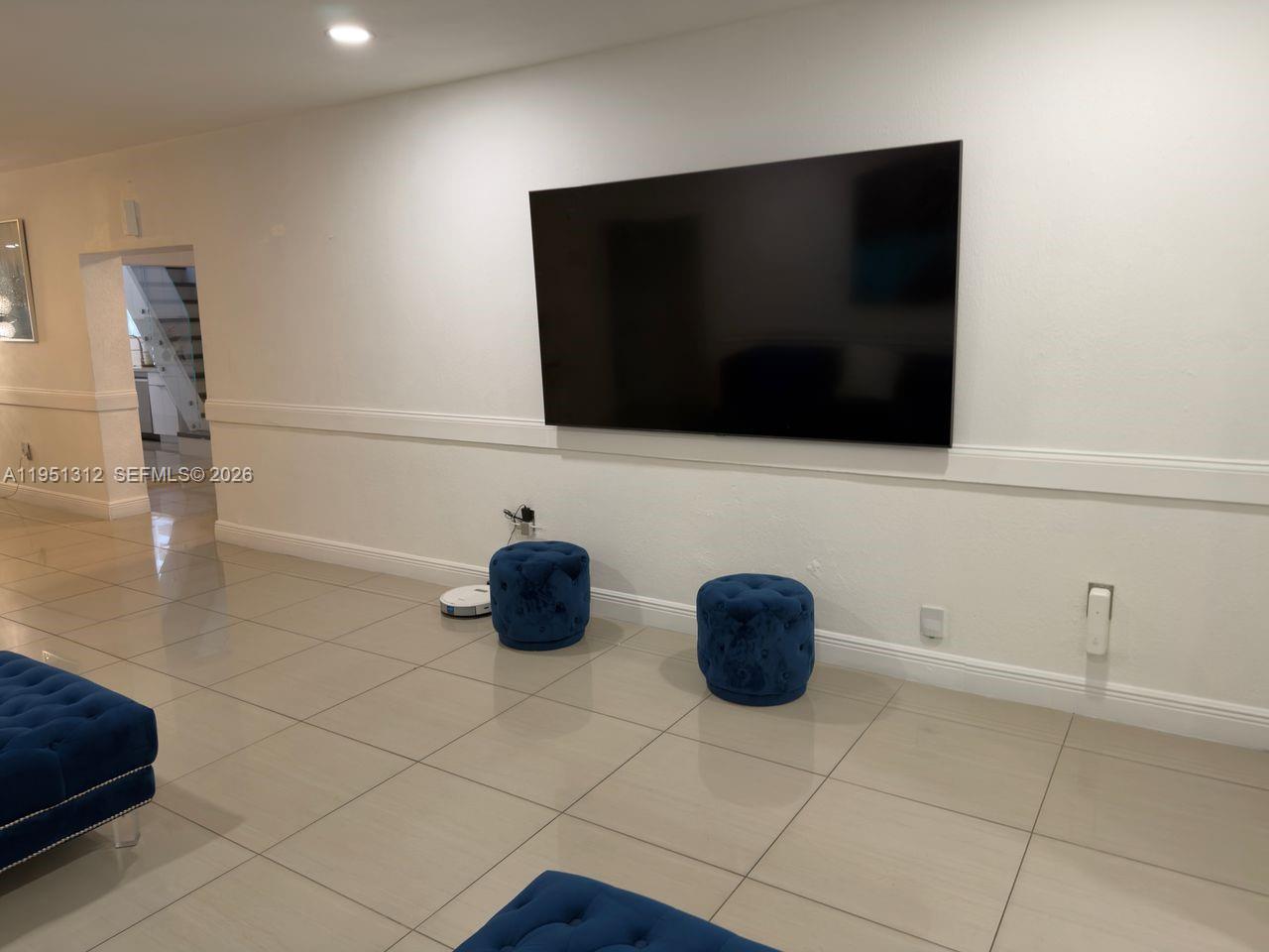 224 East 42nd Street Hialeah, FL 33013 - Photo 12 of 59 a bathroom with a sink and a mirror