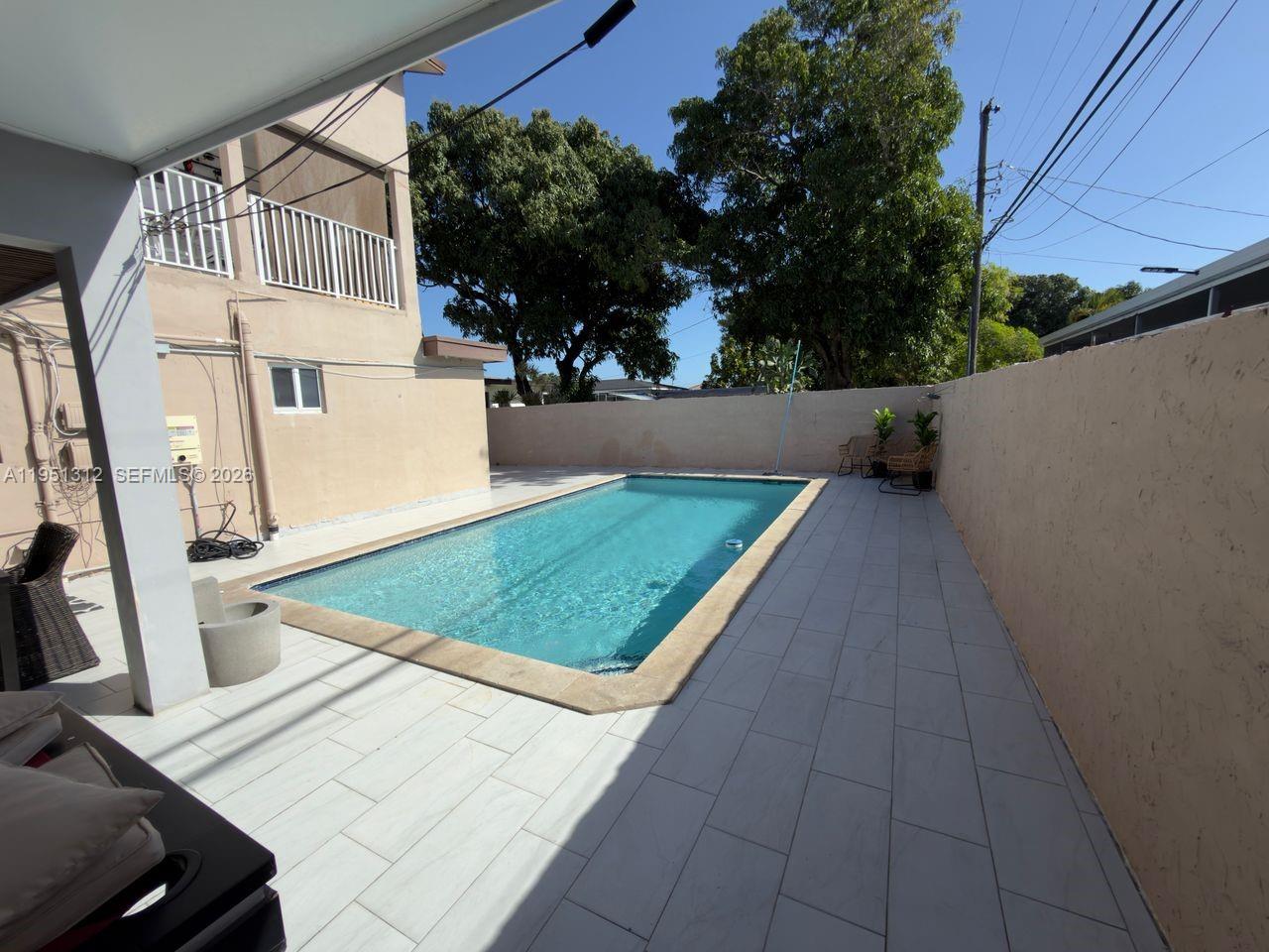 224 East 42nd Street Hialeah, FL 33013 - Photo 51 of 59 a view of a backyard with sitting area
