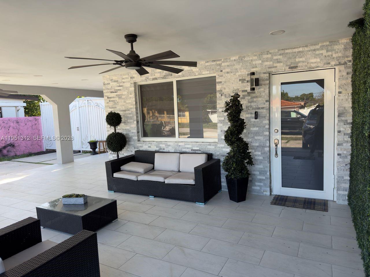 224 East 42nd Street Hialeah, FL 33013 - Photo 6 of 59 a living room with furniture and decor