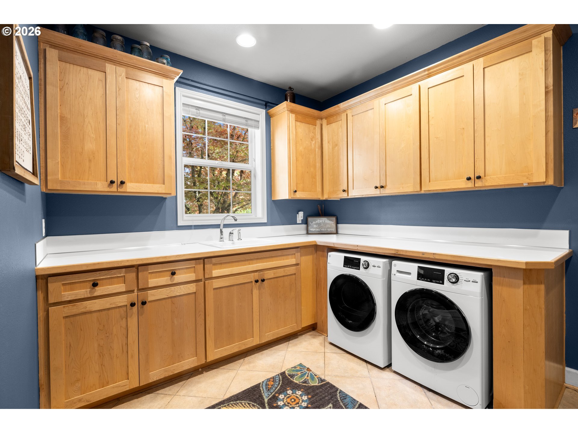 2633 Southeast Vista Way Gresham, OR 97080 - Photo 20 of 48 a utility room with sink dryer and washer