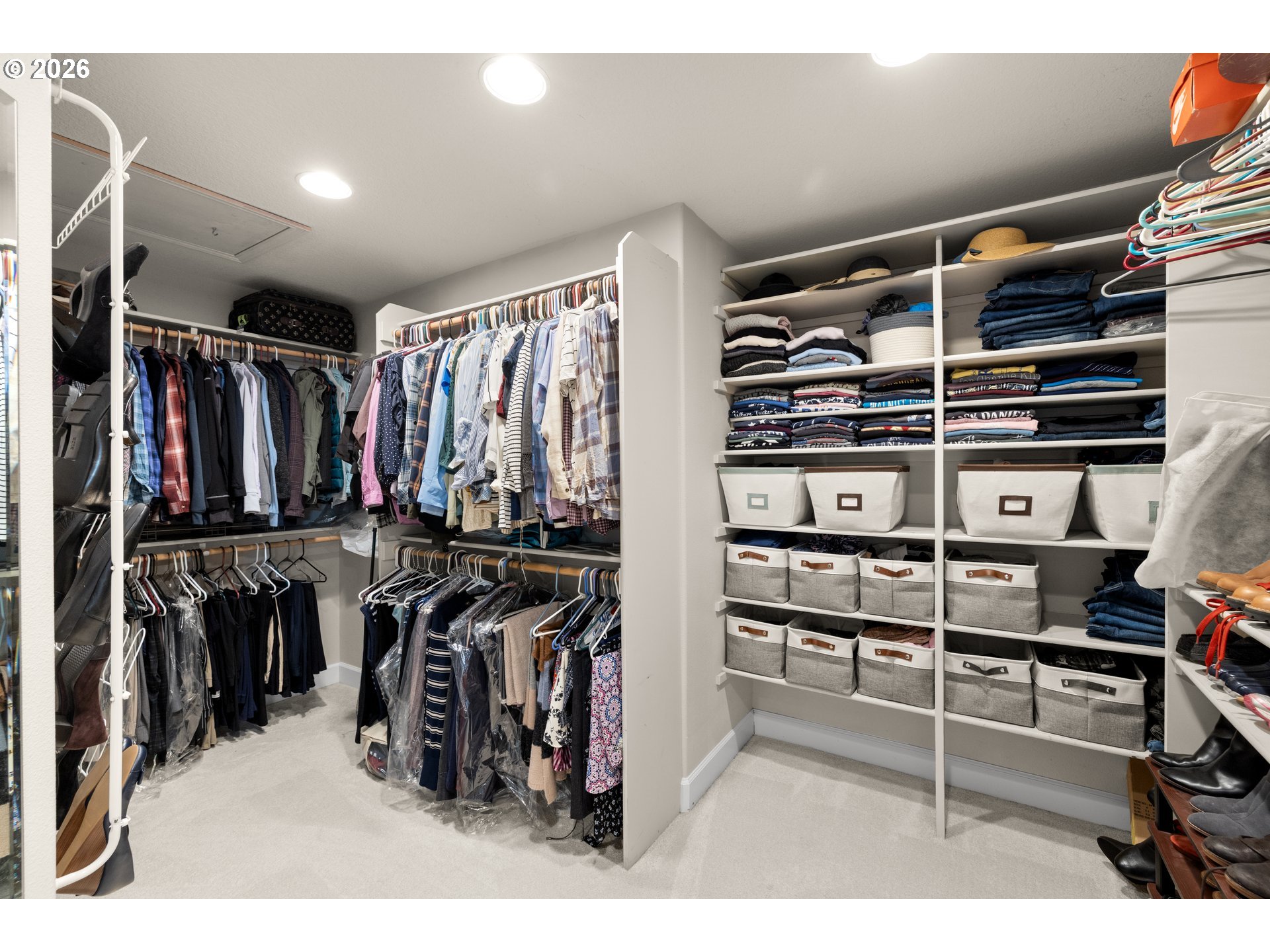 2633 Southeast Vista Way Gresham, OR 97080 - Photo 25 of 48 a view of walk in closet with clothes and shoes