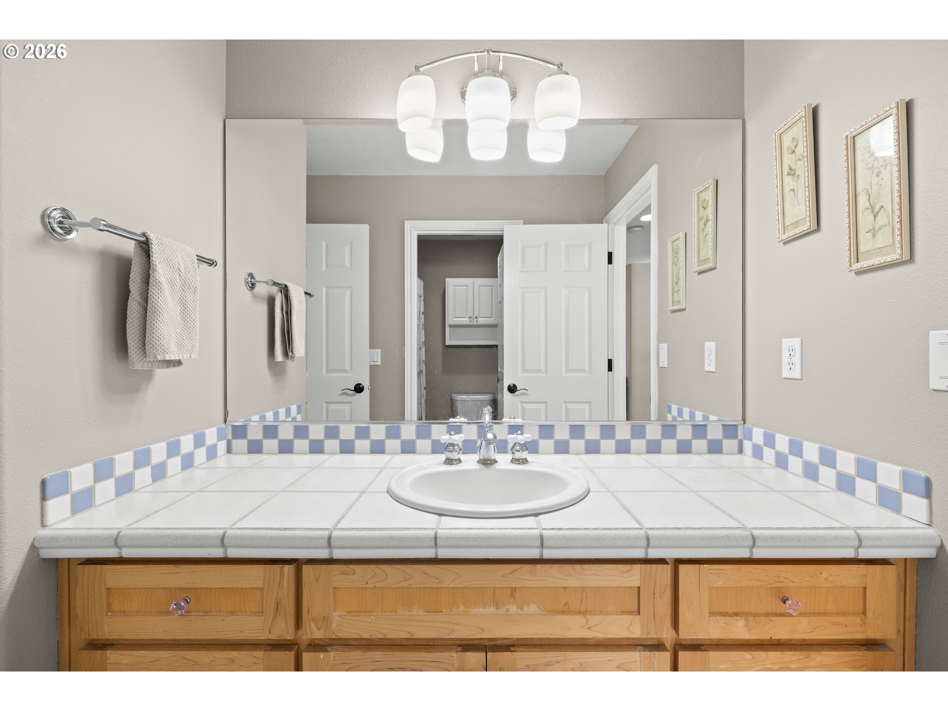 2633 Southeast Vista Way Gresham, OR 97080 - Photo 27 of 48 a bathroom with a sink double vanity and a mirror