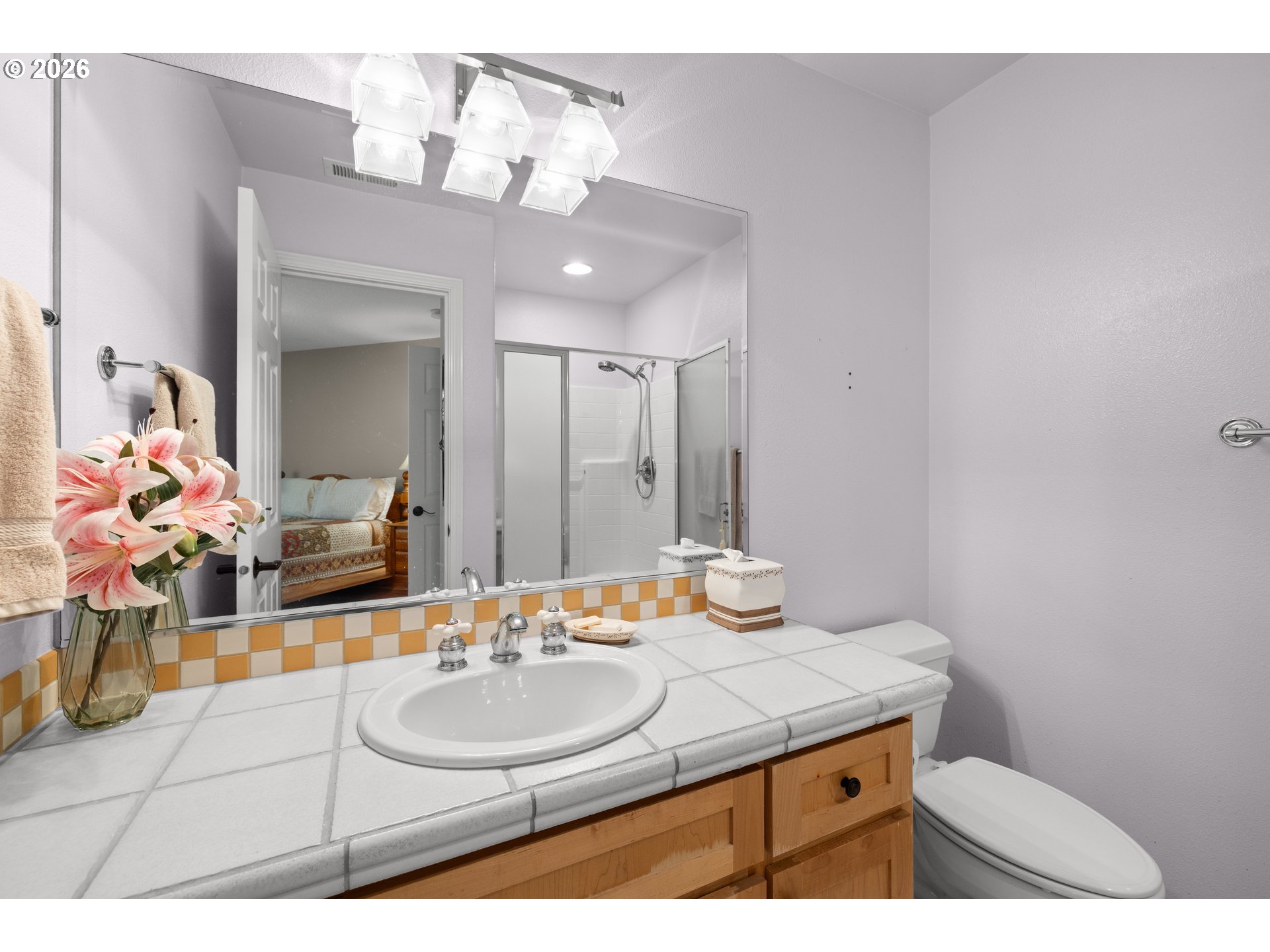2633 Southeast Vista Way Gresham, OR 97080 - Photo 29 of 48 a bathroom with a sink and a mirror